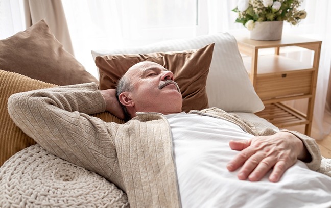 Man resting on the couch