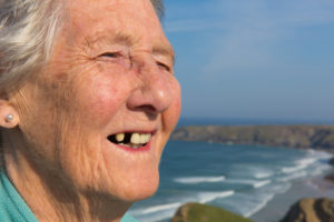 Lady with a missing front tooth