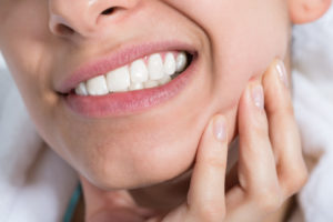 Woman with tooth pain