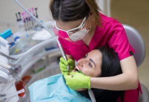 person getting their teeth cleaned