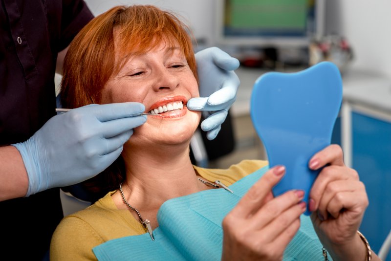 Woman with dental implant