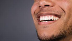 Close-up of man smiling. 